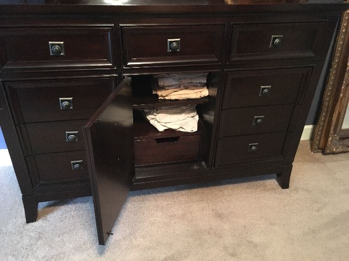 Beautiful dark cherry 9 drawer dresser and mirror.