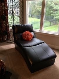 Pleather chaise/lounge chair by Ashley furniture, in excellent condition. Black.