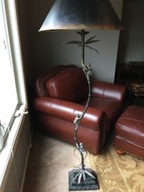 Cute metal floor lamp with monkies climbing a palm tree.