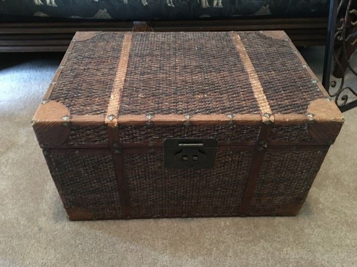 Wood and wicker trunk.