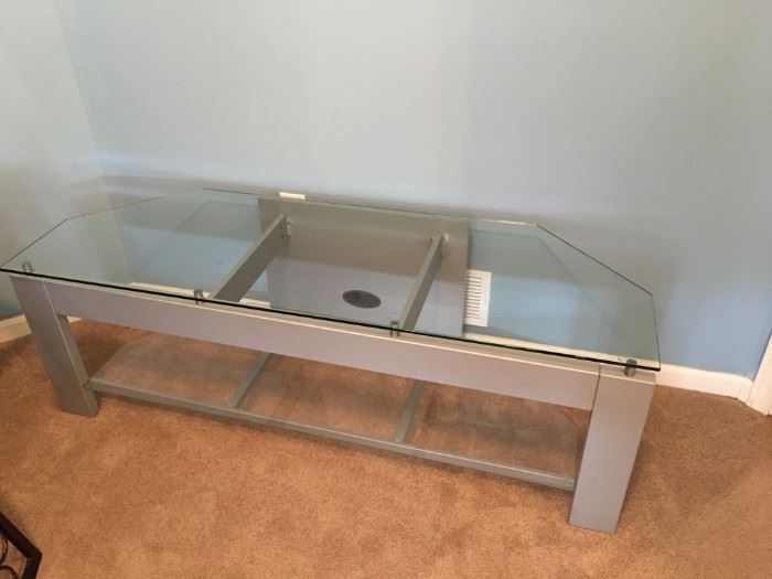 Metal and glass TV stand. 58"w X 20"d X 19"t