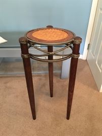 Wood, metal and wicker accent table.