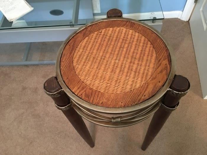 Wood, metal and wicker accent table.