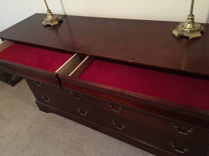 8 drawer dresser with two velvet lined top drawers.
