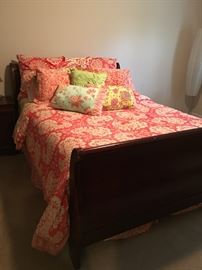 Queen sleigh bed, linens and mattress & box.