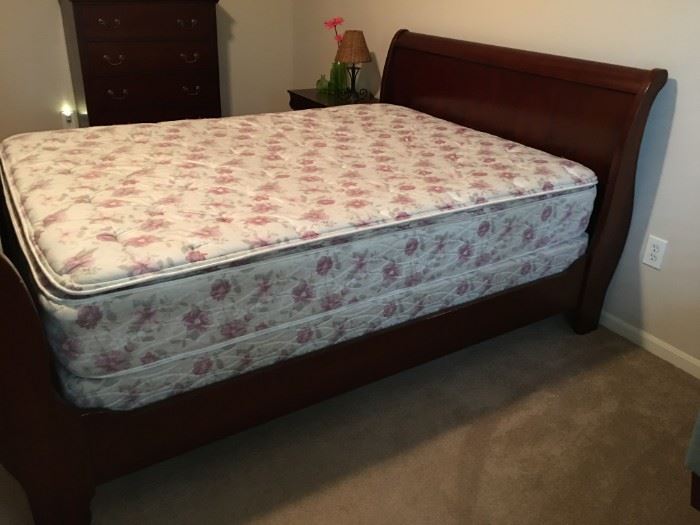 Queen sleigh bed, mattress & box.