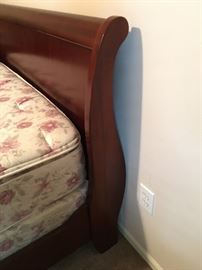 Queen sleigh bed.