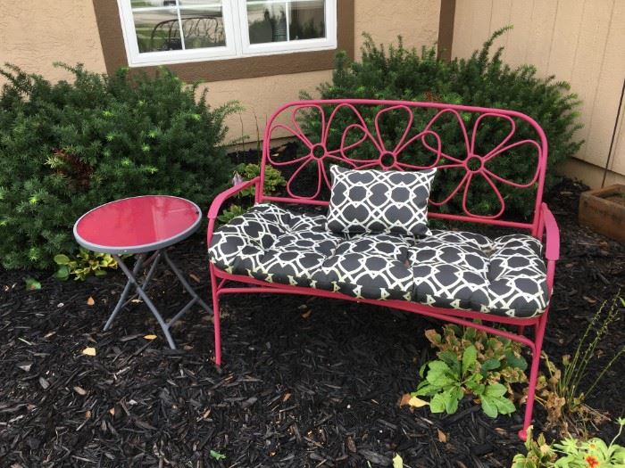 Cute as can be metal pink flower bench and pink side table!