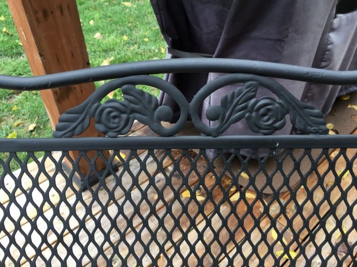 Wrought iron patio table and 6 rocker chairs in excellent condition!