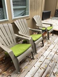 Three Adirondack chairs w/cushions.