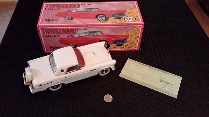 1956 Thunderbird hard top die cast car with box and certificate.