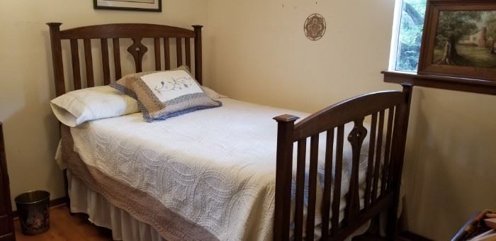 Really cute wooden framed full size bed.