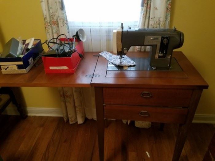 Sewing machine in cabinet