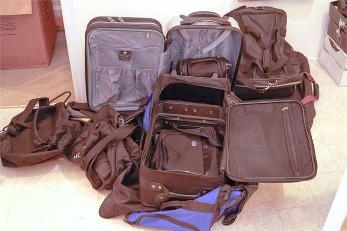 Group of Book Bags and Suitcases
