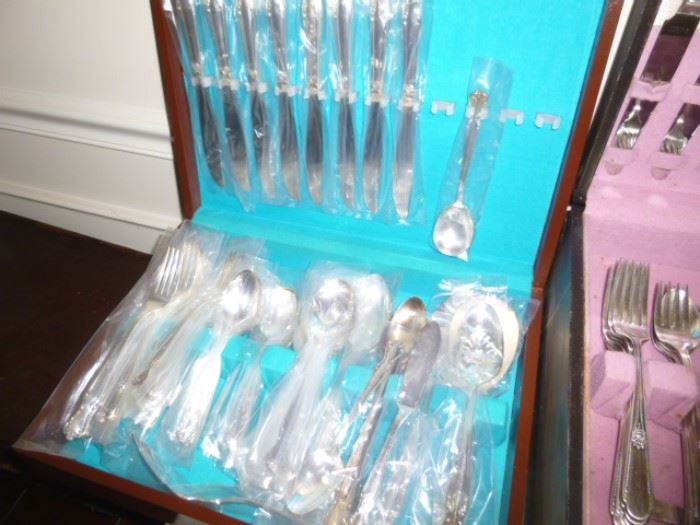 Just one of many silver plate flatware sets