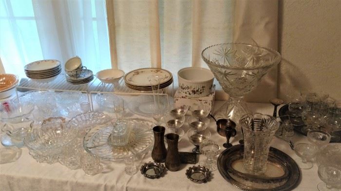 clear glass serving pieces, silver pieces, punch bowl and some much more...