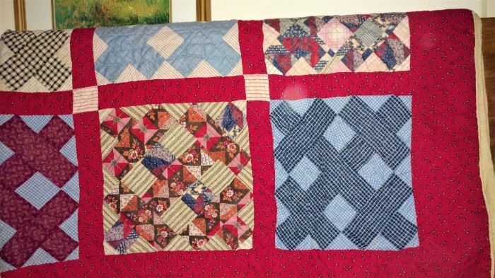 one of the 7 vintage handmade quilts