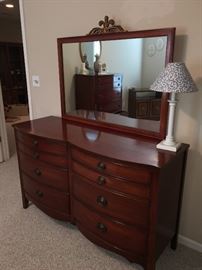 Duncan Phyfe style bow front double dresser and mirror.