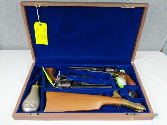 BOXED PAIR COLT US CAVALRY COMMEMORATIVE REVOLVER / Colt US Cavalry Commemorative 1777 - 1977 .44 Cal Model 1860 revolver set. Cylinders have been engraved with ocean and sailing motif. Included are the original boxes, display case and accoutrements set: attachable wood stock, Colt caps, bullet mold and maintenance tool. Model 1860, Caliber .44, Barrel Length 8", Serial Numbers 0762US / US0762 FFL #286/287
