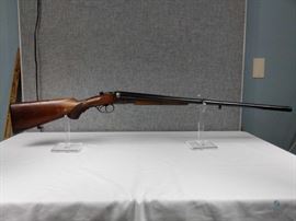 JP Sauer & Son; Appears to be SXS model / 12 gauge Shot gun. fair condition, but with broken stock. Most of the bluing is still intact. Minor scratches and pitting on the end of the barrel. Extensive engraving. Made in Germany. 489769 12. gauge, FFL #246
