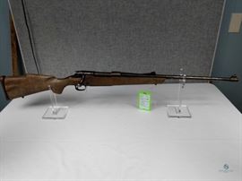 Winchester Model 70 bolt action rifle / 30.06 Wooden stock worn and chipped. Surface rust visible on the barrel. Side blades worn. Not test fired. G1245261 30-06 Springfield, FFL #247
