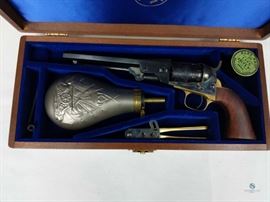 Auberti & O Navy Arms Colt / Made in Italy. Black Powder Western Carriage and Horses Theme Engraved Barrel set with Powder Horn and Bullet molds. In wooden Box. FFL #231
