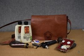 Rifle Reloading Accessories with Pouch / 2 partial bottles of Hoppe's 9 Plus Black Powder and dispenser, pouch of Lead Pellets, Bass Leather bag and Percussion Caps, other loading accessories. LOCATION 18
