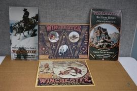 Metal Winchester Wall Hangings / 4 colorful, raised metal wall hangings. 16" x 8" and larger. LOCATION 18
