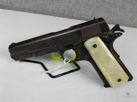 Colt Model 1911 / CF 1911 US Army. Pre WWII edition, appears to be made in 1913. Mother of Pearl grips in excellent condition. Rust and pitting on frame in front of trigger guard. Slide and action works, not test-fired. 58641 .45 cal, FFL #264
