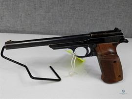Walther Olympia / .22 cal target pistol. Solid wooden grips. Some bluing worn, but in good -excellent condition. Slide and trigger function. Not test-fired. Includes one magazine. 8372 .22 cal, FFL #265
