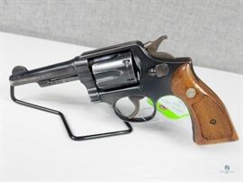 Smith & Wesson Model Police Special / .38 cal Square butt revolver, fixed sight, 3-screw frame. Appears to be a Police Special. Excellent condition. No signs of rust. Wooden grips with S&W Inlay medallions. 88145 .38 cal, FFL #284
