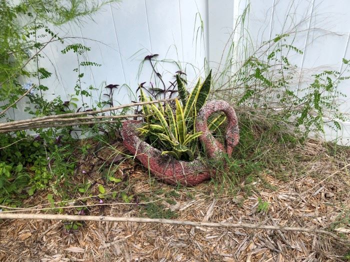 Swan concrete plant holder with plant