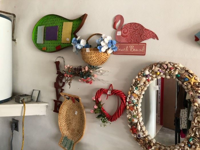 Misc. wall decorations including a shell mirror