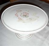 Unusual milk glass cake plate