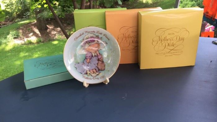 Avon Mother's Day collectible plates.