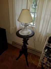 nice unusual table and oil lamp