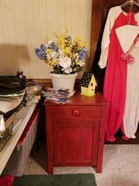 red cabinet and vintage Halloween costumes