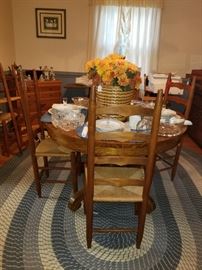 Dining room table, chairs and rug