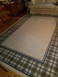 living room rug, now rolled up to keep clean during the sale