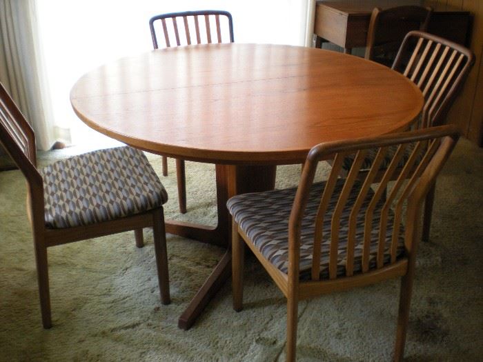 House of Denmark Dining table and 4 chairs, with two leaves for the table. Chairs newly reupholstered.