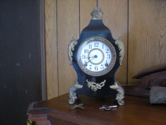Antique winding mantle clock.