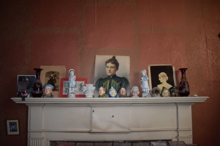 Antique Figurines, Portraits, Prints, and Vases adorn this original fireplace mantle from this fine home built in 1815