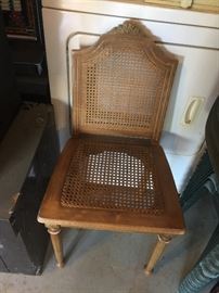 Vanity vanity chair that has a matching vanity, and matching bedroom set!!! Cane is still in very good condition.