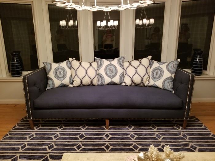 navy linen sofa with tufted back and side arms, studded detail  and 5 down pillows.  93Wx36Dx33H   $2,000