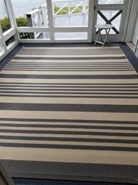 Outdoor 9x12 rug.  tan and grey  $230.00