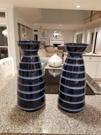 two tall navy and blue vases . $50 ea.