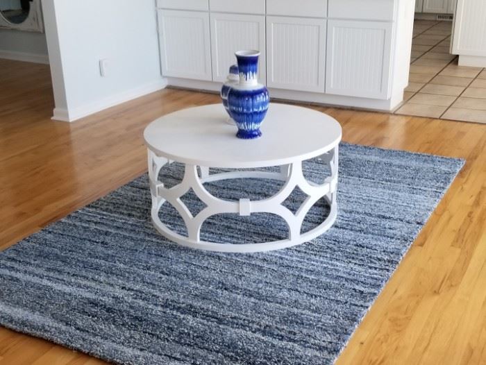 2 blue, navy and white rag-style rugs.  5x8 $600.  8x11  $900