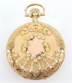 AWW Co. 14k Multi Gold Pendant Watch - 0 size, 15 j, DMK, SW, PS, Fancy 14k multi Gold with inset Diamond, HC, SSD w/Roman numerals. Serial #15403546. 34.0 grams total weight. Slight wear. Winds, sets and running when cataloged.