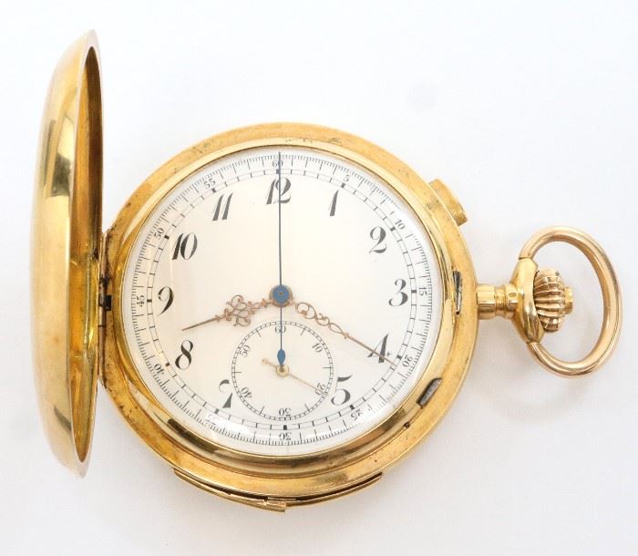 Swiss 18k Gold pocket watch with Chronograph and Minute repeat. 58mm, SW, LS, Fancy Engraved 18k Yellow Gold, HC, SSD w/Arabic numerals. Serial # 204028. 124.6 grams total weight. Some wear, front cover re-monogramed and reinforced from behind with an 1852 American $1/2 Gold coin. Winds, sets, running and striking correctly when cataloged.