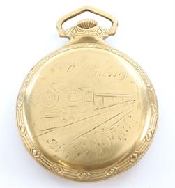 South Bend "Studebaker" Railroad Watch -16 size, 21 j, Adj 8 pos, DR, DMK, SW, PS, Nawco "Railroad Model" GF, OF, SSD "Montgomery" dial w/Arabic numerals marked "Studebaker". Serial #1182661. Some wear, plastic crystal, monogrammed rear cover. Winds, sets and running when cataloged.